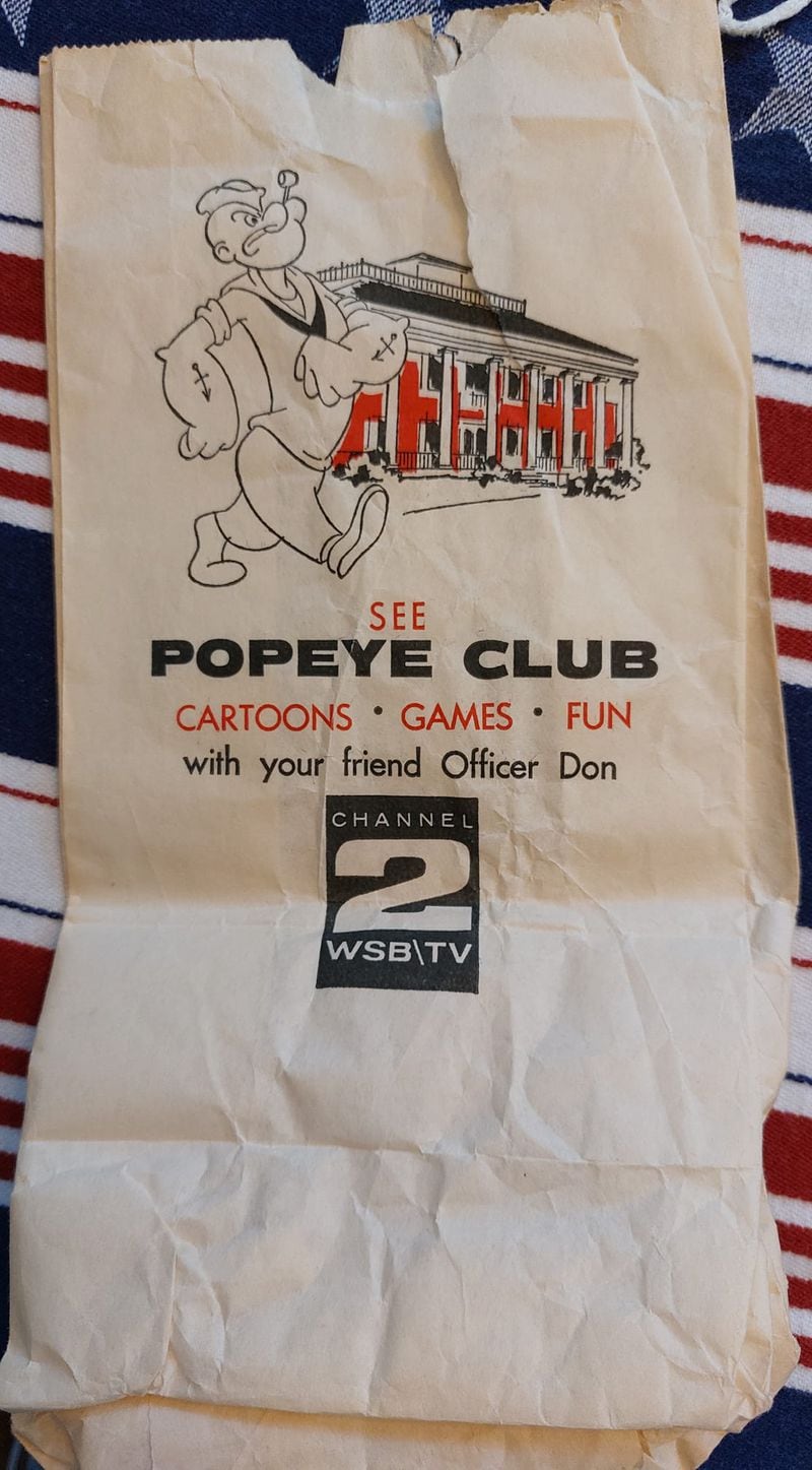 A vintage gift bag from the 1960s featuring The Popeye Club, courtesy of Mary Anne Carroll Gordon.