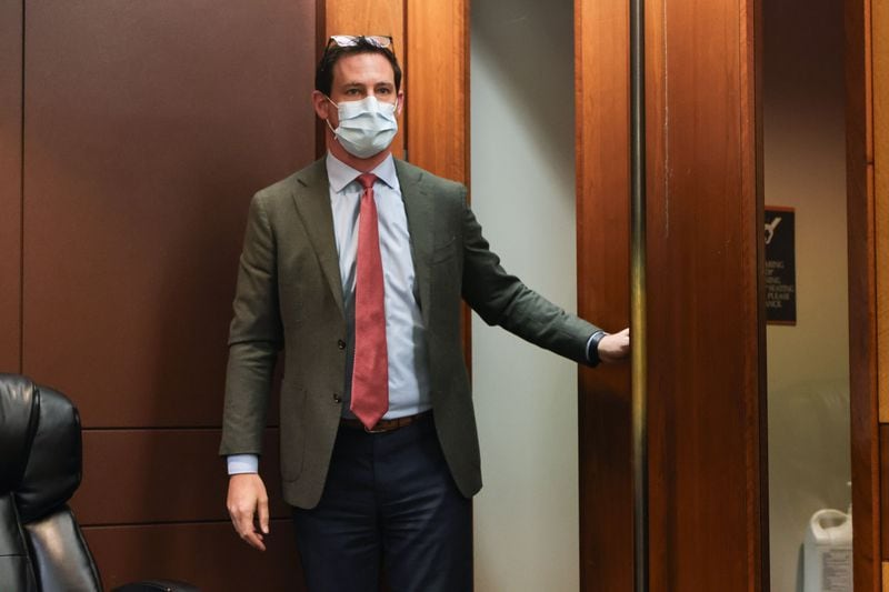 Lead prosecutor John Fowler walks into the courtroom after bringing in a witness during a motions hearing in the RICO case against protesters of the Atlanta Public Safety Training Center at Fulton County Courthouse on Wednesday, July 31, 2024. (Natrice Miller/ AJC)