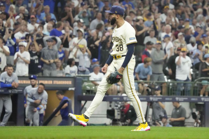 Milwaukee Brewers pitcher Devin Williams (38) reacts after striking out Los Angeles Dodgers' Shohei Ohtani for the final out in the ninth inning of a baseball game, Thursday, Aug. 15, 2024, in Milwaukee. (AP Photo/Kayla Wolf)