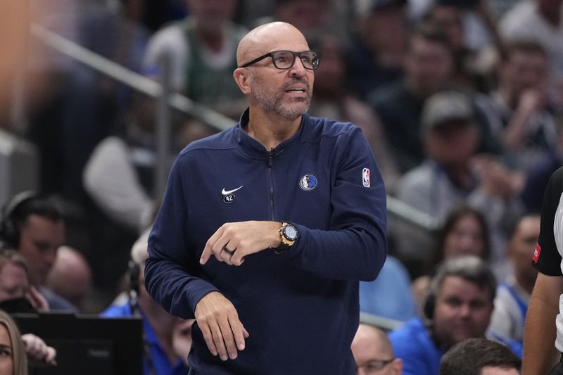 Dallas Mavericks head coach Jason Kidd signals to his players during the first half in Game 4 of the NBA basketball finals against the Boston Celtics, Friday, June 14, 2024, in Dallas. (AP Photo/Julio Cortez)