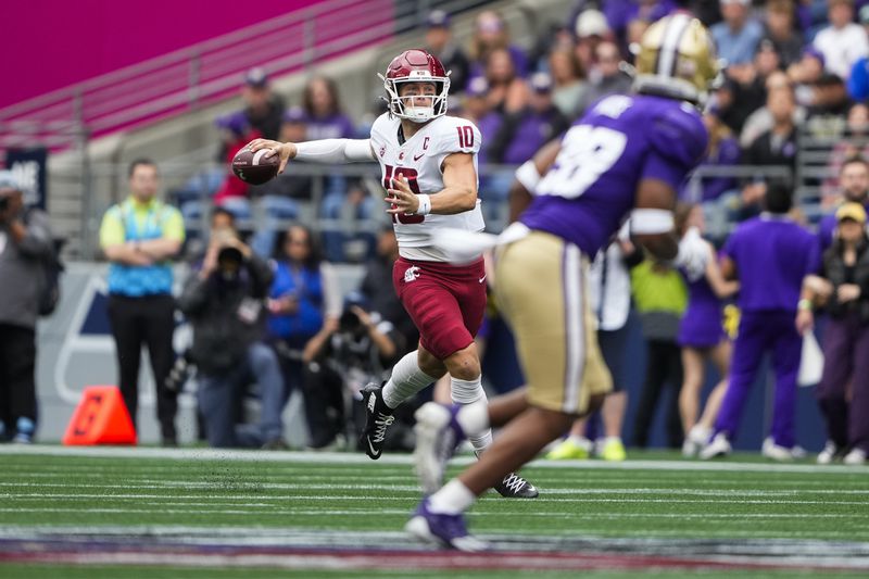 Washington State quarterback John Mateer (10) throws against Washington during the first half of an NCAA college football game Saturday, Sept. 14, 2024, in Seattle. (AP Photo/Lindsey Wasson)