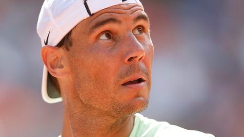 Spain's Rafael Nadal looks up during a training session at the Roland Garros stadium, Saturday, May 25, 2024 in Paris. The French Open tennis tournament starts Sunday May 26, 2024. (AP Photo/Jean-Francois Badias)