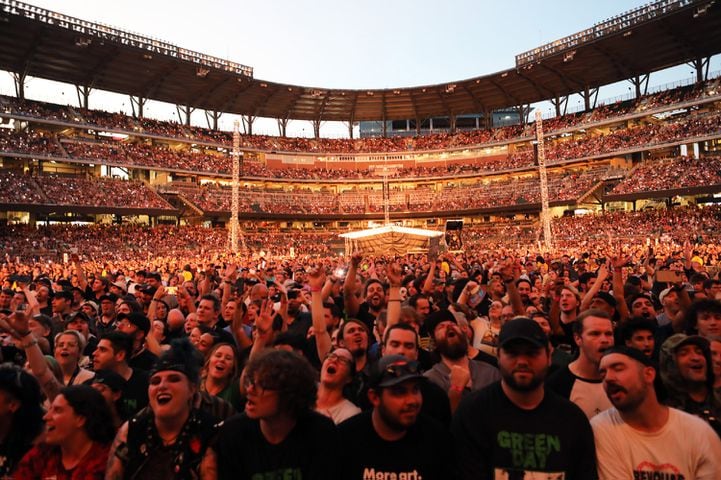 Green Day brought their Saviors Tour to Truist Park on Wednesday, August 28, 2024. Opening acts were Smashing Pumpkins, Rancid, The Linda Lindas and Paradox.. 
Robb Cohen for the Atlanta Journal-Constitution