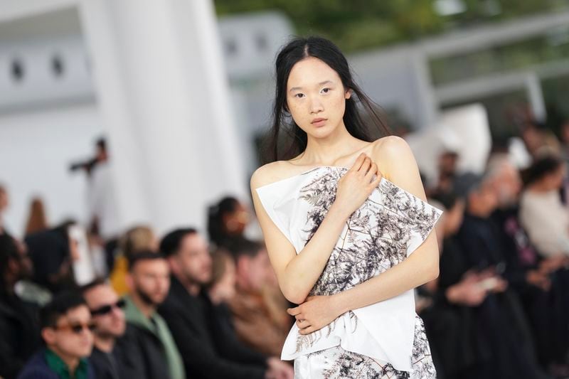 A model wears a creation as part of the Issey Miyake Spring/Summer 2025 collection presented Friday, Sept. 27, 2024 in Paris. (Photo by Scott A Garfitt/Invision/AP)