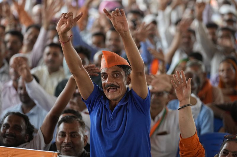 Bharatiya Janata Party (BJP) party workers attend a rally, ahead of Jammu and Kashmir Assembly elections in Jammu, India, Saturday Sep.7, 2024.(AP Photo/Channi Anand, File)