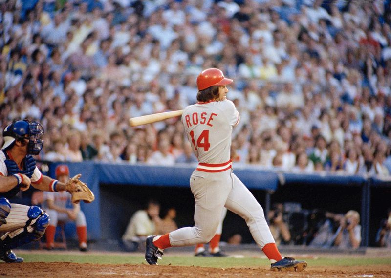 Pete Rose of the Cincinnati Reds in action at the bat against the Atlanta Braves in Atlanta, Aug. 2, 1978. At left is Atlanta catcher Joe Nolan. (AP Photo, File)