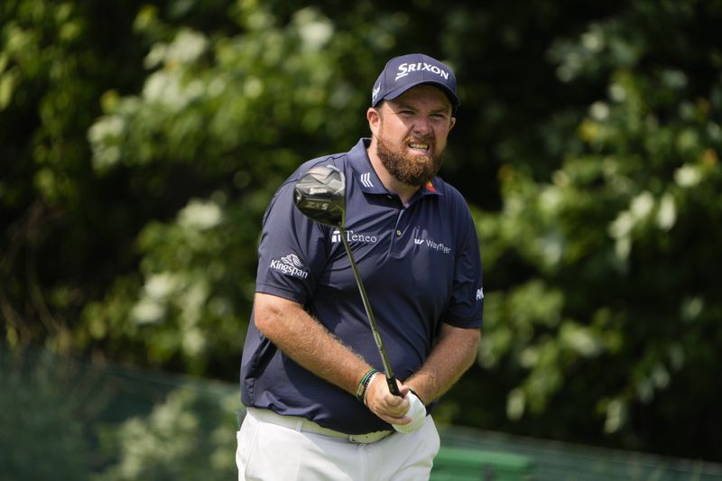 Shane Lowry, of Ireland, follows his shot from the 13th tee during the second round of the Travelers Championship golf tournament at TPC River Highlands, Friday, June 21, 2024, in Cromwell, Conn. (AP Photo/Seth Wenig)