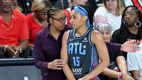 Atlanta Dream coach Tanisha Wright instructs guard Allisha Gray (15) during the first half at the Gateway Center Arena, Friday, July 12, 2024, in College Park. (Hyosub Shin / AJC)