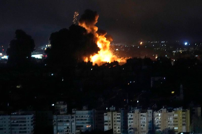 Flames rise from Israeli airstrikes in Dahiyeh, Beirut, Lebanon, Friday, Oct. 4, 2024. (AP Photo/Hussein Malla)