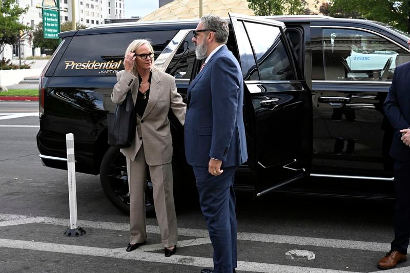 Elisabeth Murdoch, left, arrives at the Second Judicial District Court in Reno, Nev., Monday Sept. 16, 2024. (AP Photo/Andy Barron)