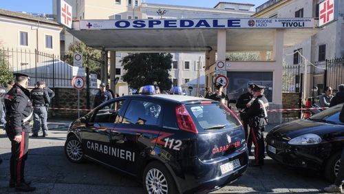 FILE - Carabinieri (Italian paramilitary police) officers outside the San Giovanni Evangelista Hospital in Tivoli, Italy, on Dec. 9, 2023. (Mauro Scrobogna/LaPresse via AP, File)