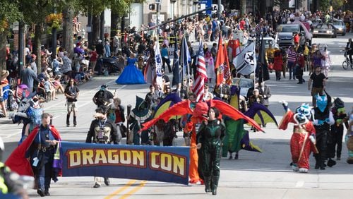 The Dragon Con Parade, pictured here in 2022, marches up Peachtree Street this year beginning at 10 a.m. Saturday, Sept. 2. Steve Schaefer/steve.schaefer@ajc.com)