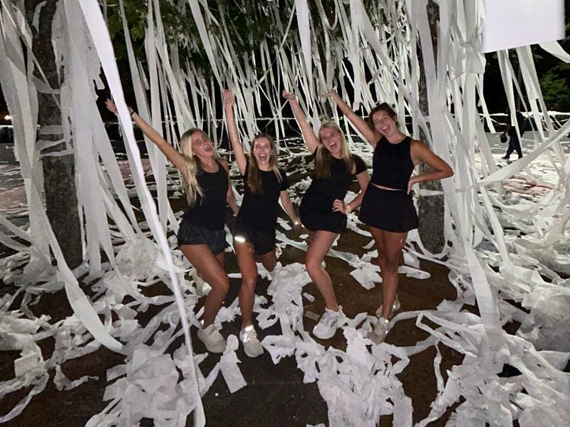 The first day of school at Marietta High School is an absorbent one as seniors decorate with hundreds of rolls of bath tissue the night before. It's a sanctioned activity with guidelines regarding where students can ply their trade, and they know they must clean up after their fun. From left: Brooklyn McVicker, Camilla Weigle, Charlotte Bullington and Jane Collins.

Photo courtesy of Sarah Bullington