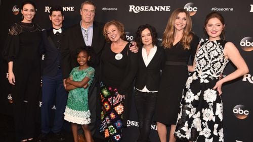 From left, Whitney Cummings, Michael Fishman, John Goodman, Jayden Rey, Roseanne Barr, Sara Gilbert, Sarah Chalke and Emma Kenney attend the premiere of ABC's "Roseanne" at Walt Disney Studio Lot on March 23, 2018 in Burbank, California.