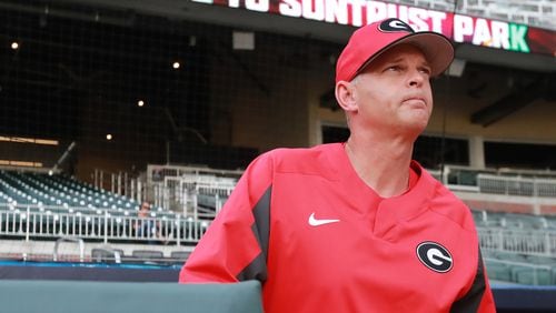 April 23, 2019 Atlanta: Georgia head baseball coach Scott Stricklin takes the field as he prepares his team to play Georgia Tech in the Spring Classic NCAA college baseball game at SunTrust Park on Tuesday, April 23, 2019, in Atlanta.    Curtis Compton/ccompton@ajc.com