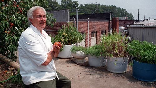 Gabe Bencivenga the former co-owner of Gene and Gabe s Italian Lodge on the rooftop of his restaurant where he hasd several fruit trees and vegetables growing from barrels and drums. Bencivenga's restaurants and cabaret were the place to be in Atlanta and Roswell. He died earlier this week. AJC File