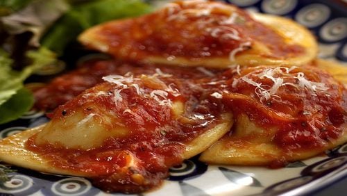 Nations come together in a pasta bowl as an Italian tomato-onion sauce coats squares of Polish pierogi. (Bob Fila/Chicago Tribune/TNS)