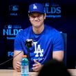 Los Angeles Dodgers' Shohei Ohtani speaks to reporters in a press conference in preparation for Game 1 of a baseball NL Division Series against the San Diego Padres in Los Angeles, Friday, Oct. 4, 2024. (AP Photo/Ashley Landis)