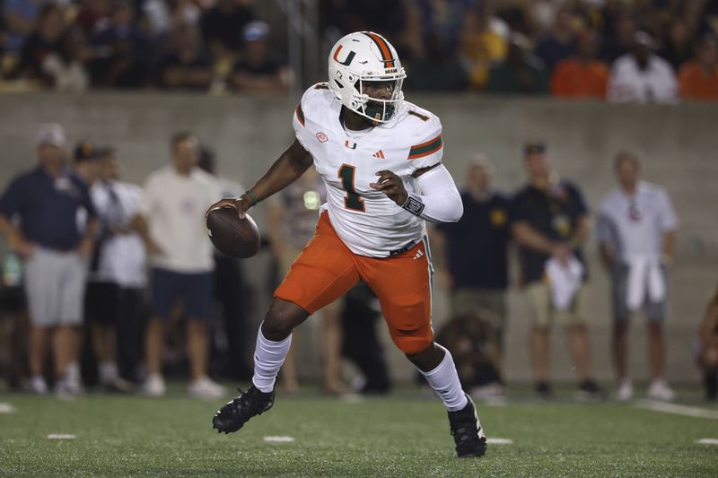 Miami quarterback Cam Ward (1) runs against California during the first half of an NCAA college football game in Berkeley, Calif., Saturday, Oct. 5, 2024. (AP Photo/Jed Jacobsohn)