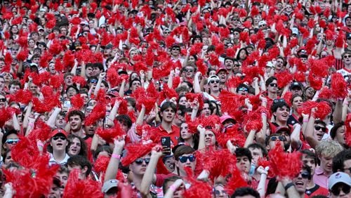 Georgia fans cheer before an NCAA football game between Georgia and Auburn at Sanford Stadium, Saturday, October 5, 2024, in Athens. (Hyosub Shin / AJC)