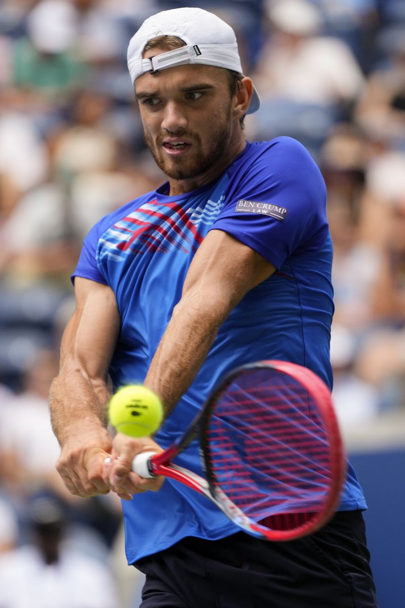 Tomas Machac, of the Czech Republic, returns a shot to Sebastian Korda, of the United States, during the second round of the U.S. Open tennis championships, Thursday, Aug. 29, 2024, in New York. (AP Photo/Kirsty Wigglesworth)