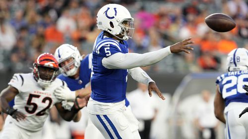 Indianapolis Colts quarterback Anthony Richardson (5) throws a pass during the first half of a preseason NFL football game against the Cincinnati Bengals, Thursday, Aug. 22, 2024, in Cincinnati. (AP Photo/Jeff Dean)