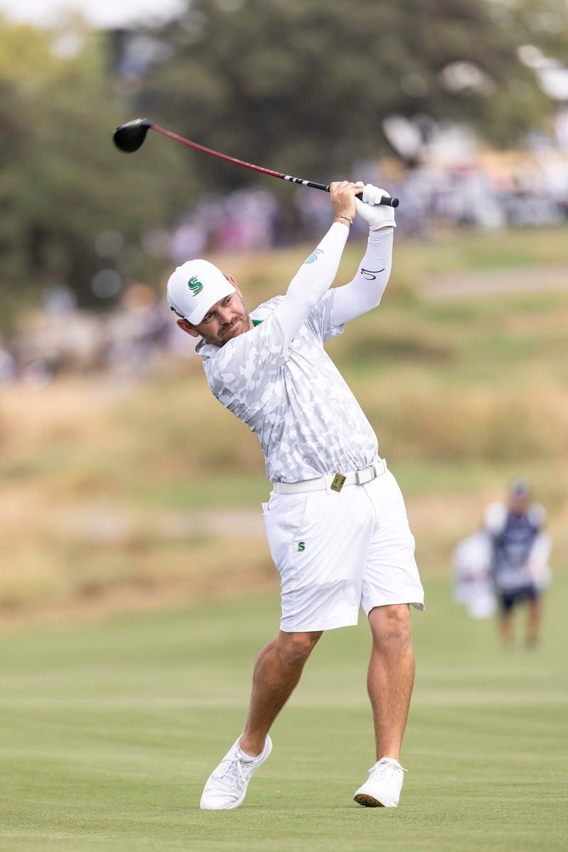 Captain Louis Oosthuizen, of Stinger GC, hits from the 17th fairway during the semifinals of LIV Golf Team Championship Dallas at Maridoe Golf Club, Saturday, Sept. 21, 2024, in Carrollton, Texas. (Chris Trotman/LIV Golf via AP)