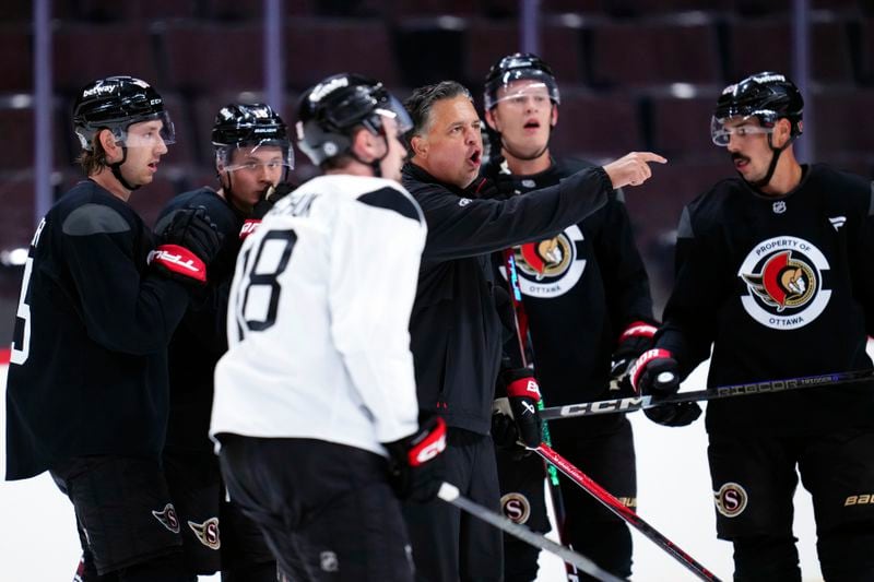 Ottawa Senators head coach Travis Green yells instructions to his players during NHL hockey training camp in Ottawa, Ontario, Thursday, Sept. 19, 2024. (Sean Kilpatrick/The Canadian Press via AP)