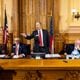 (L-R) Georgia Election Board member Sara Tindall Ghazal, member Janelle King, executive director Mike Coan, chairman John Fervier, member Rick Jeffares, and member Janice Johnston appear before a board meeting at the Capitol in Atlanta on Friday, September 20, 2024. The election board is set to decide on sweeping rule changes less than a month before early voting begins. (Arvin Temkar / AJC)