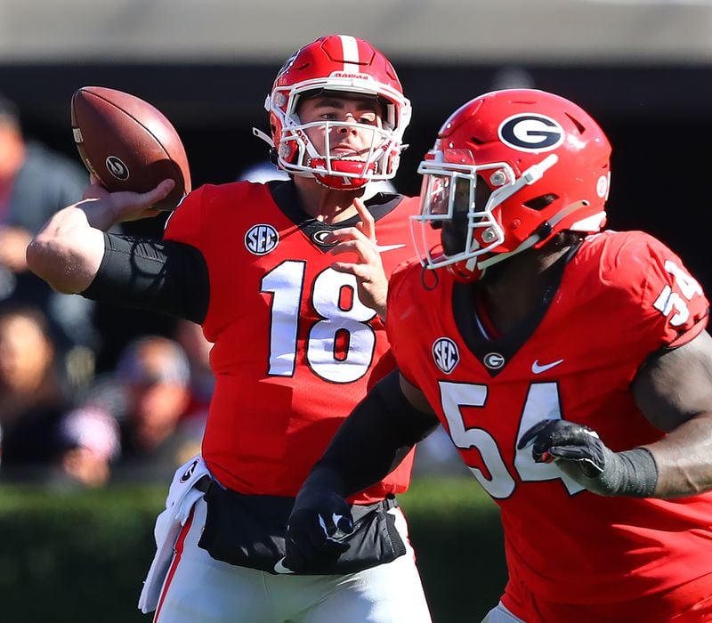 Georgia quarterback JT Daniels completes a pass to Brock Bowers during the second quarter against Charleston Southern in a NCAA college football game on Saturday, Nov. 20, 2021, in Athens.    “Curtis Compton / Curtis.Compton@ajc.com”