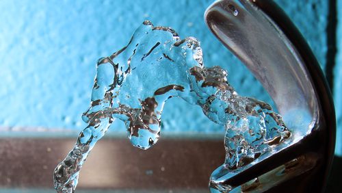 FILE - Water flows from a water fountain in Concord, N.H., on Friday, Jan. 7, 2011. (AP Photo/Jim Cole, File)