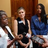 (Left to right) Rep. Jasmine Clark, D–Lilburn, Sen. Elena Parent, D–Atlanta, and Sen. Nikki Merritt, D–Grayson, speak to the media at the Georgia State Capitol following a press conference on Wednesday, July 24, 2024, to respond to the state's decision not to approve AP African American Studies. (Natrice Miller/ AJC)