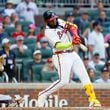 Atlanta Braves designated hitter Marcell Ozuna (20) hits a two-run single during the seventh inning against the New York Mets at Truist Park on Monday, Sept. 30, 2024, in Atlanta. 
(Miguel Martinez/ AJC)