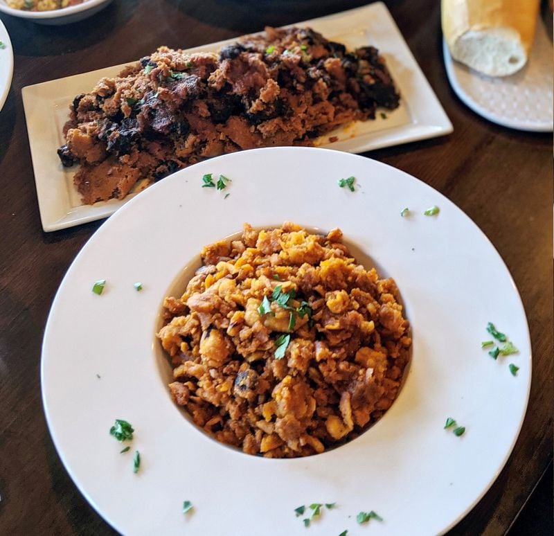 At Feedel Bistro, brunch includes chechebsa (pieces of soft flat bread smothered with berbere sauce; below) and quanta firfir (a beef jerky-like dish with berbere sauce and pieces of injera; above). CONTRIBUTED BY FEEDEL BISTRO