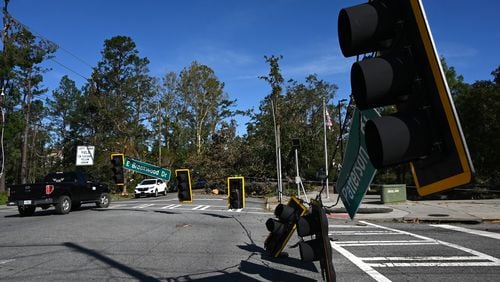 Fallen traffic signals and wires are seen in Valdosta on Saturday, Sept. 28, 2024. The devastation in Valdosta was extensive after the South Georgia city was battered with hurricane-force winds on Helene’s path across the state. Valdosta, a part of Lowndes County, is one of several dozen Georgia counties where students applying to Georgia Tech under Early Action 1 are getting an extension because of the storm damage recovery effort. (Hyosub Shin / AJC)