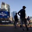 Atlanta Braves players Luke Williams, left, and Eli White, center, wait to their turn during batting practice before game 1 of the NL Wild Card Series against the San Diego Padres at Petco Park, Tuesday, October 1, 2024, in San Diego, Ca.  (Jason Getz / AJC)

