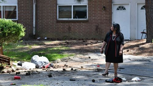 July 15, 2022 Atlanta - Atlanta City Councilwoman Andrea Boone, who introduced the resolution urging a crackdown of negligent landlords, checks conditions of one of negligent apartment buildings at Vue at Harwell in Atlanta on Friday, July 15, 2022. The Atlanta City Council formally urged law enforcement officials to pursue charges against negligent apartment landlords, in response to an Atlanta Journal-Constitution investigation into the issue. (Hyosub Shin / Hyosub.Shin@ajc.com)