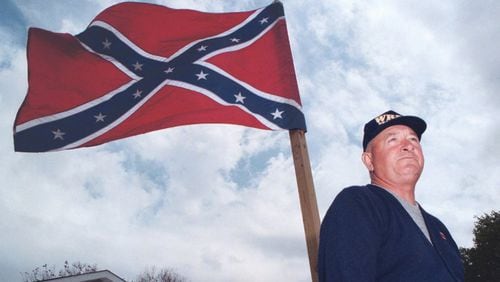 A Winthrop University poll of Southern adults finds that while 55 percent of its white respondents see the Rebel battle flag as a symbol of Southern pride, only 44 percent of those same respondents give the Confederate emblem a favorable rating. (AP Photo/The Huntsville Times, Glenn Baeske)