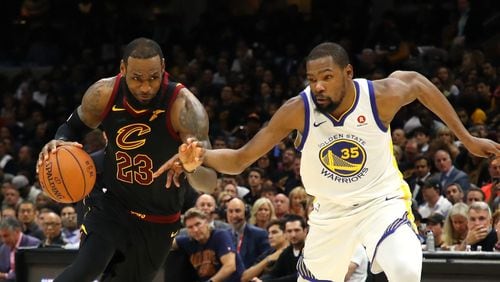 CLEVELAND, OH - JUNE 08: LeBron James #23 of the Cleveland Cavaliers handles the ball against Kevin Durant #35 of the Golden State Warriors in the second half during Game Four of the 2018 NBA Finals at Quicken Loans Arena on June 8, 2018 in Cleveland, Ohio. NOTE TO USER: User expressly acknowledges and agrees that, by downloading and or using this photograph, User is consenting to the terms and conditions of the Getty Images License Agreement. (Photo by Gregory Shamus/Getty Images) ORG XMIT: 775170288 ORIG FILE ID: 970178216