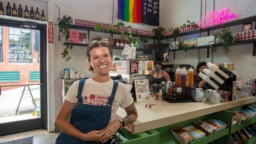Kayla Bellman poses at her coffee stand Finca to Filter inside Wild Heaven West End Brewery on July 27, 2023. (Jenni Girtman for The Atlanta Journal Constitution)