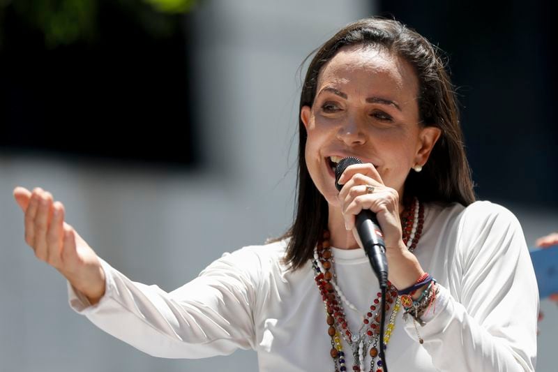 Opposition leader Maria Corina Machado speaks during a protest against the reelection of President Nicolás Maduro one month after the disputed presidential vote which she claims the opposition won by a landslide, in Caracas, Venezuela, Wednesday, Aug. 28, 2024. (AP Photo/Cristian Hernandez)