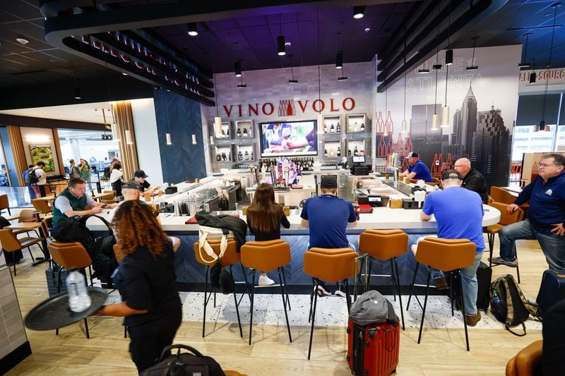 The menu at Vino Volo in Concourse T is a mix of the chain’s traditional wine bar items and dishes from Southern National. (Miguel Martinez / AJC)