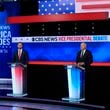 Sen. JD Vance of Ohio and Minnesota Gov. Tim Walz at the Oct. 1 vice presidential debate hosted by CBS News in New York. (Matt Rourke/AP)