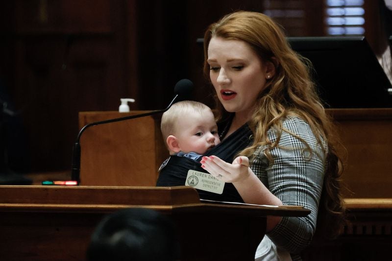State Rep. Lauren Daniel, shown holding her infant son Zane while speaking during this year's legislative session, lost to fellow Republican Noelle Kahaian in a Henry County-based district. (Miguel Martinez/miguel.martinezjimenez@ajc.com)