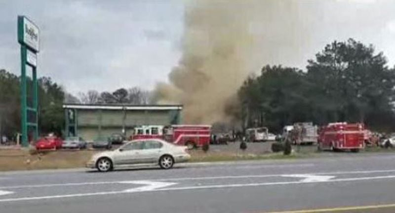 About 250 people were displaced by a fire at the Budgetel motel in Cobb County. (Credit: Channel 2 Action News)