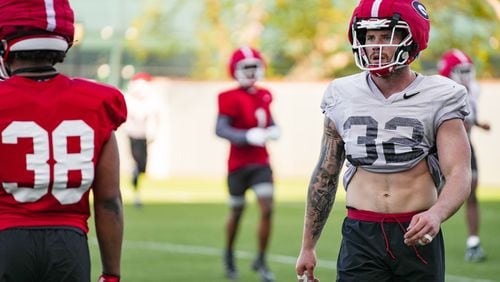 Georgia outside linebacker Chaz Chambliss (32), pictured here during a recent spring football practice session in Athens, is giving serious consideration to a career after football as an MMA fighter. (Tony Walsh/UGA Athletic Association)