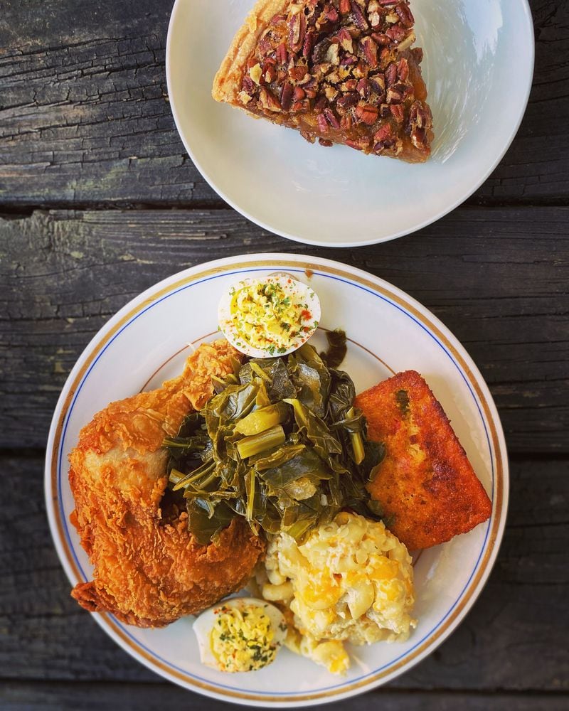 It doesn’t get any more Southern than Magnolia Room’s fried chicken with macaroni and cheese, collard greens, deviled eggs, jalapeño cornbread, and pecan pie. Wendell Brock for The Atlanta Journal-Constitution