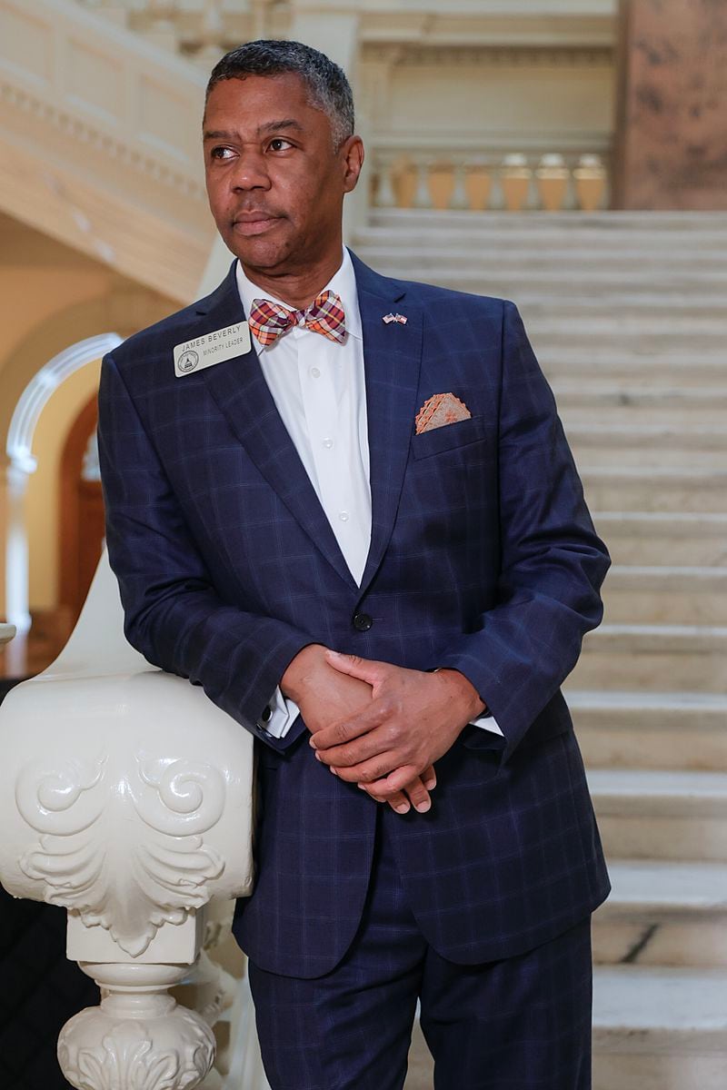 Dark, tailored suits are a given for men in the General Assembly, so they have to focus on ties, pocket squares and socks to stand out. House Minority Leader James Beverly, D-Macon, has a favorite item to focus on. "I love bowties because they represent freedom," he said. (Natrice Miller/ natrice.miller@ajc.com)