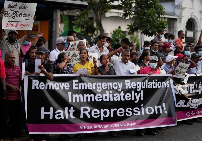 National People's Power supporters shout slogans during a protest in Colombo, Sri Lanka, Saturday, May 7, 2022. (AP Photo/Eranga Jayawardena, File)