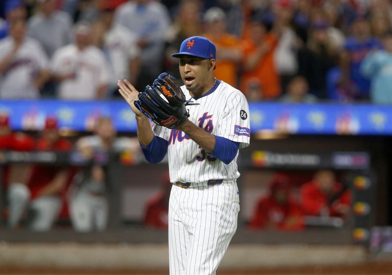 New York Mets relief pitcher Edwin Diaz reacts after getting Philadelphia Phillies' Alec Bohm to groundout to end the top of the eighth inning during a baseball game, Sunday, Sept. 22, 2024, in New York. (AP Photo/John Munson)